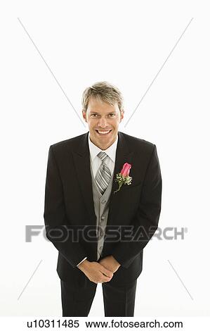 Stock Photography - Groom with hands clasped . Fotosearch