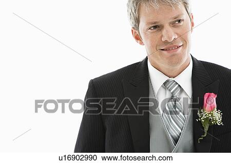 Portrait of Caucasian male in tuxedo with boutonniere. View Large Photo Image Stock Image - Portrait of Caucasian male in tuxedo with boutonniere.. Fotosearch