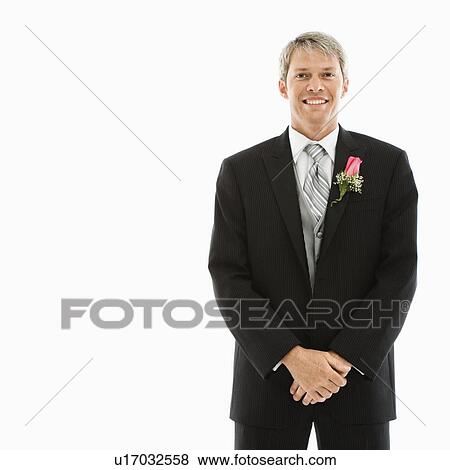 Portrait of Caucasian male in tuxedo with boutonniere. View Large Photo Image Stock Photo - Portrait of Caucasian male in tuxedo with boutonniere.. Fotosearch