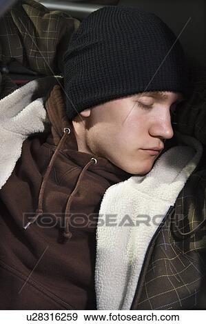 Young man sleeping. View Large Photo Image Stock Photo - Young man sleeping.. Fotosearch