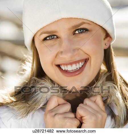 Stock Image - Female wearing knit cap. Fotosearch