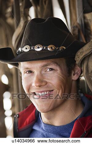 Male wearing cowboy hat View Large Photo Image Stock Photograph - Male wearing cowboy hat . Fotosearch