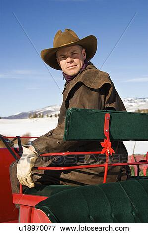 Stock Photo - Man in sleigh . Fotosearch