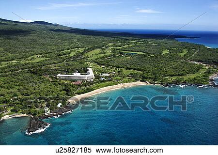Aerial of beachfront hotel resort in Maui, Hawaii. View Large Photo Image Stock Photography - Aerial of beachfront hotel resort in Maui, Hawaii.. Fotosearch