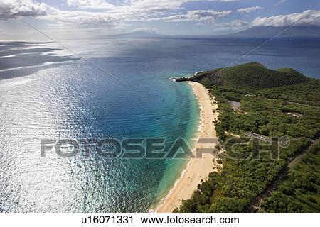 Aerial of coastline with sandy beach and Pacific ocean in Maui, Hawaii View Large Photo Image Stock Image - Aerial of coastline with sandy beach and Pacific ocean in Maui, Hawaii. Fotosearch