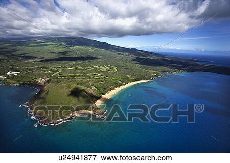 Aerial of coastline with sandy beach and crater and Pacific ocean in Maui, Hawaii. View Large Photo Image Stock Photo - Aerial of coastline with sandy beach and crater and Pacific ocean in Maui, Hawaii.. Fotosearch