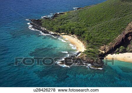 Stock Photo - Aerial of Maui, Hawaii beach and Pacific ocean. Fotosearch
