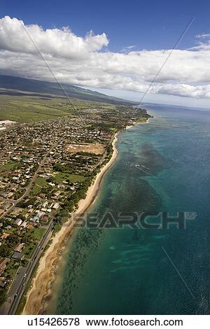 Aerial of Maui, Hawaii coastline with beach and buildings View Large Photo Image Stock Photo - Aerial of Maui, Hawaii coastline with beach and buildings. Fotosearch