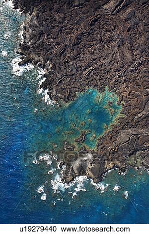 Aerial of Pacific ocean and Maui, Hawaii coast with lava rocks. View Large Photo Image Stock Image - Aerial of Pacific ocean and Maui, Hawaii coast with lava rocks.. Fotosearch