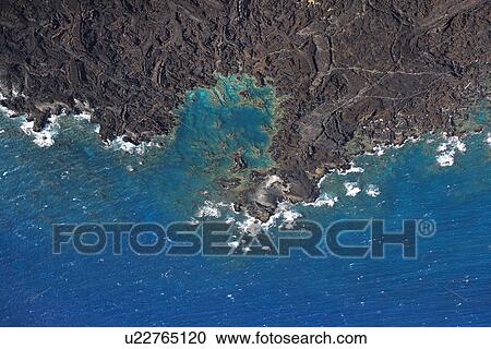 Aerial of Pacific ocean and Maui, Hawaii coast with lava rocks. View Large Photo Image Stock Image - Aerial of Pacific ocean and Maui, Hawaii coast with lava rocks.. Fotosearch