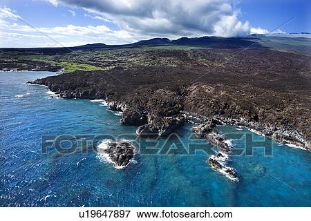 Aerial of Pacific ocean and Maui, Hawaii coast with lava rocks View Large Photo Image Stock Photo - Aerial of Pacific ocean and Maui, Hawaii coast with lava rocks. Fotosearch