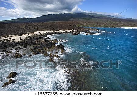 Aerial of Pacific ocean and Maui, Hawaii coast with lava rocks. View Large Photo Image Stock Photography - Aerial of Pacific ocean and Maui, Hawaii coast with lava rocks.. Fotosearch