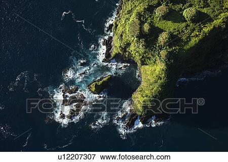 Aerial of rocky coast on Pacific ocean in Maui, Hawaii. View Large Photo Image Stock Photo - Aerial of rocky coast on Pacific ocean in Maui, Hawaii.. Fotosearch