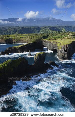Aerial of rocky coast on Pacific ocean in Maui, Hawaii View Large Photo Image Stock Photo - Aerial of rocky coast on Pacific ocean in Maui, Hawaii. Fotosearch