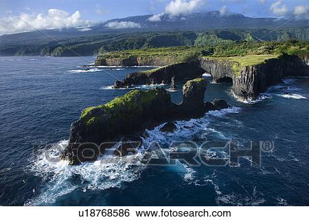 Aerial of rocky coast on Pacific ocean in Maui, Hawaii View Large Photo Image Stock Photograph - Aerial of rocky coast on Pacific ocean in Maui, Hawaii. Fotosearch