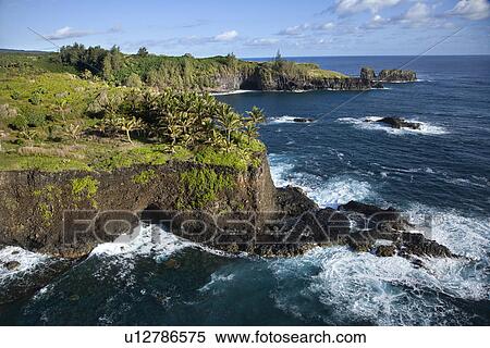 Aerial of rocky coast on Pacific ocean in Maui, Hawaii View Large Photo Image Stock Photography - Aerial of rocky coast on Pacific ocean in Maui, Hawaii. Fotosearch