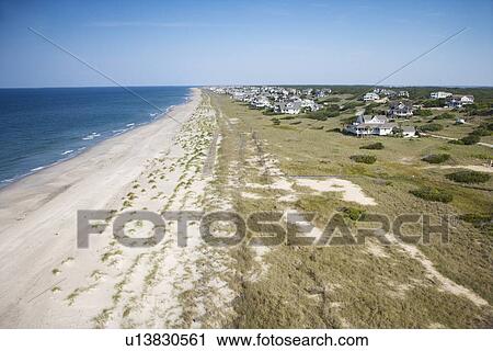 Aerial view of beach and residential neighborhood at Bald Head Island, North Carolina. View Large Photo Image Stock Image - Aerial view of beach and residential neighborhood at Bald Head Island, North Carolina.. Fotosearch