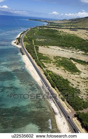 Aerial view of road next to coastline on Maui, Hawaii View Large Photo Image Stock Image - Aerial view of road next to coastline on Maui, Hawaii. Fotosearch