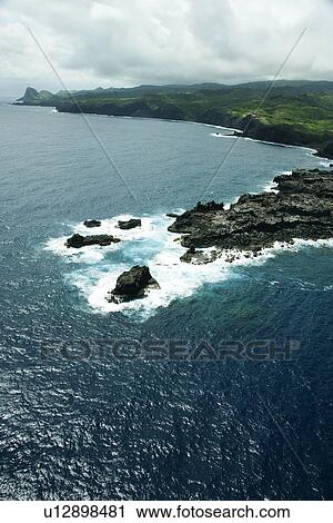 Stock Image - Aerial view of rocky coastline of Maui, Hawaii. Fotosearch