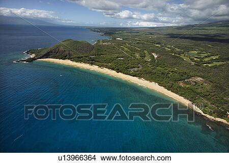 Coastline with sandy beach and Pacific ocean in Maui, Hawaii. View Large Photo Image Picture - Coastline with sandy beach and Pacific ocean in Maui, Hawaii.. Fotosearch