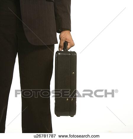 African American businessman in suit holding briefcase. View Large Photo Image Stock Photo - African American businessman in suit holding briefcase.. Fotosearch