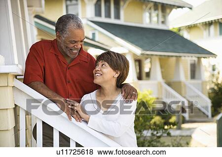 Couple smiling at each other View Large Photo Image Stock Photo - Couple smiling at each other. Fotosearch