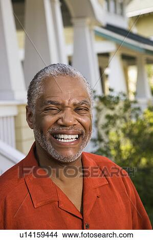 Man smiling at viewer View Large Photo Image Picture - Man smiling at viewer. Fotosearch