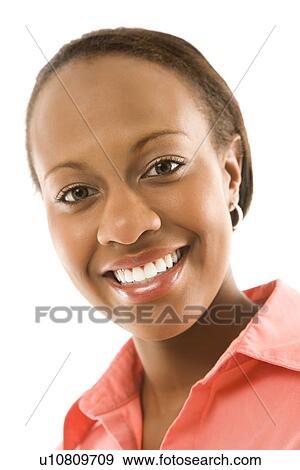Portrait of African American woman smiling against white background. View Large Photo Image Stock Photo - Portrait of African American woman smiling against white background.. Fotosearch