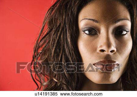 Stock Photography - Young adult African American female face close up.. Fotosearch