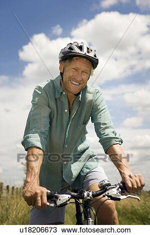 Portrait of male cyclist View Large Photo Image Stock Image - Portrait of male cyclist. Fotosearch