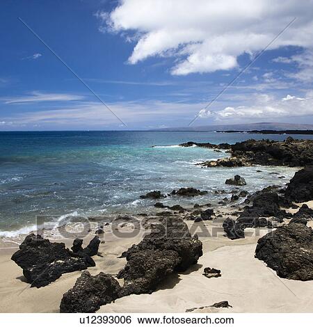 Beach in Maui, Hawaii with lava rocks View Large Photo Image Stock Photograph - Beach in Maui, Hawaii with lava rocks. Fotosearch