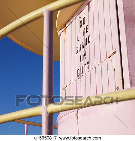 Close-up of pink art deco lifeguard tower with no lifeguard on duty sign in Miami, Florida, USA. View Large Photo Image Stock Photo - Close-up of pink art deco lifeguard tower with no lifeguard on duty sign in Miami, Florida, USA.. Fotosearch