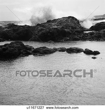 Landscape of waves crashing into rocky Hawaii coast. View Large Photo Image Stock Photo - Landscape of waves crashing into rocky Hawaii coast.. Fotosearch