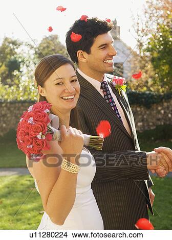 Picture - A wedding couple after the ceremony. Fotosearch