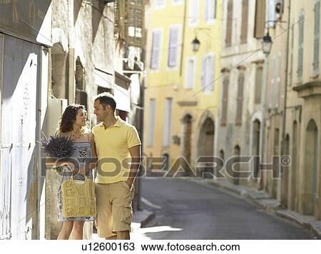 Couple standing in street View Large Photo Image Stock Image - Couple standing in street. Fotosearch