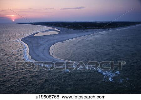 Aerial of east coast island beach of Bald Head Island, North Carolina View Large Photo Image Stock Photo - Aerial of east coast island beach of Bald Head Island, North Carolina. Fotosearch