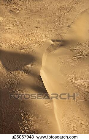 Stock Photo - Aerial of sand dunes in Vermillion Canyon, California. Fotosearch