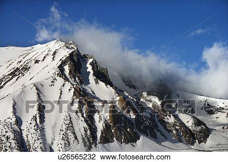 Aerial of snow covered mountain landscape in California View Large Photo Image Stock Image - Aerial of snow covered mountain landscape in California. Fotosearch