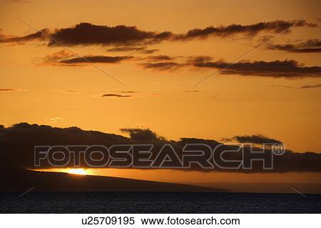 Orange sunset behind island in Pacific ocean View Large Photo Image Stock Photography - Orange sunset behind island in Pacific ocean. Fotosearch