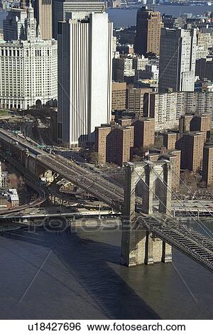 Aerial view of Brooklyn Bridge with Chinatown and New York City buildings View Large Photo Image Stock Photograph - Aerial view of Brooklyn Bridge with Chinatown and New York City buildings. Fotosearch