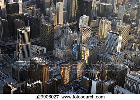 Aerial view of buildings in downtown Chicago, Illinois View Large Photo Image Stock Photo - Aerial view of buildings in downtown Chicago, Illinois. Fotosearch