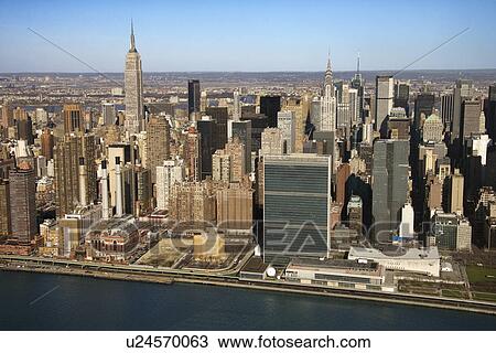 Aerial view of East River and Midtown Manhattan Buildings in New York City View Large Photo Image Stock Image - Aerial view of East River and Midtown Manhattan Buildings in New York City . Fotosearch