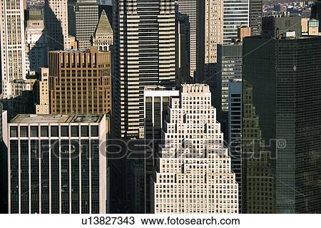 Aerial view of Manhattan buildings in New York City View Large Photo Image Stock Image - Aerial view of Manhattan buildings in New York City. Fotosearch