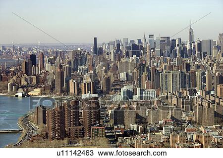 Stock Image - Aerial view of Manhattan in New York City. Fotosearch