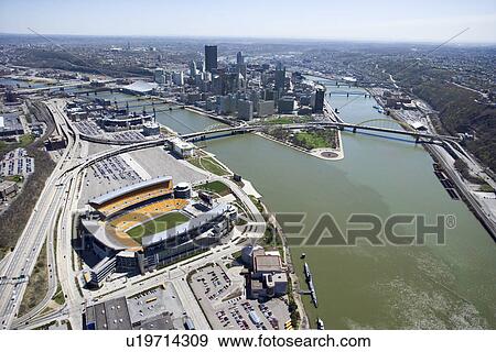 Aerial view of Pittsburgh, Pennsylvania with skyscrapers and stadium and rivers. View Large Photo Image Stock Photo - Aerial view of Pittsburgh, Pennsylvania with skyscrapers and stadium and rivers.. Fotosearch