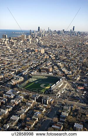 Aerial view of Wrigley Field with Chicago, Illinois skyline in background View Large Photo Image Stock Photo - Aerial view of Wrigley Field with Chicago, Illinois skyline in background. Fotosearch