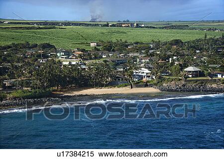 Stock Photography - Aerial of houses on coast of Maui, Hawaii. Fotosearch