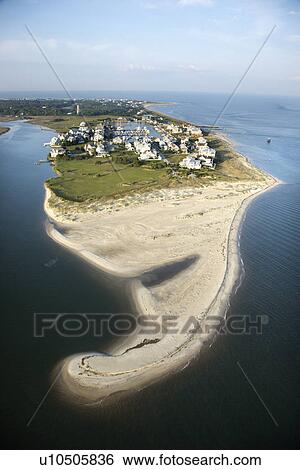 Aerial view of beach and residential community on Bald Head Island, North Carolina. View Large Photo Image Stock Photograph - Aerial view of beach and residential community on Bald Head Island, North Carolina.. Fotosearch