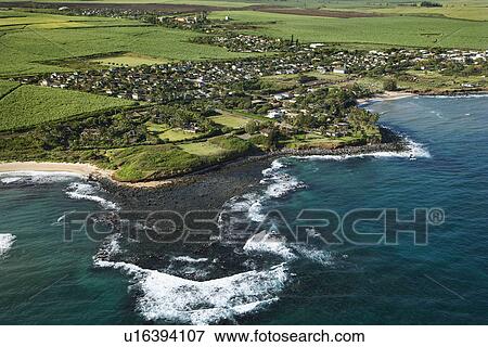 Aerial view of coastal community in Maui, Hawaii. View Large Photo Image Stock Photo - Aerial view of coastal community in Maui, Hawaii.. Fotosearch
