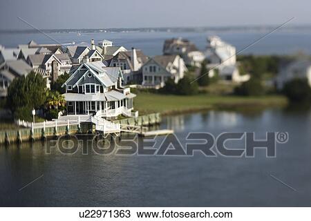 Stock Image - Aerial view of coastal community on Bald Head Island, North Carolina. Fotosearch